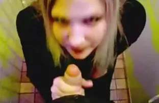 xxx Young girl blows cock and jerks him with his feet